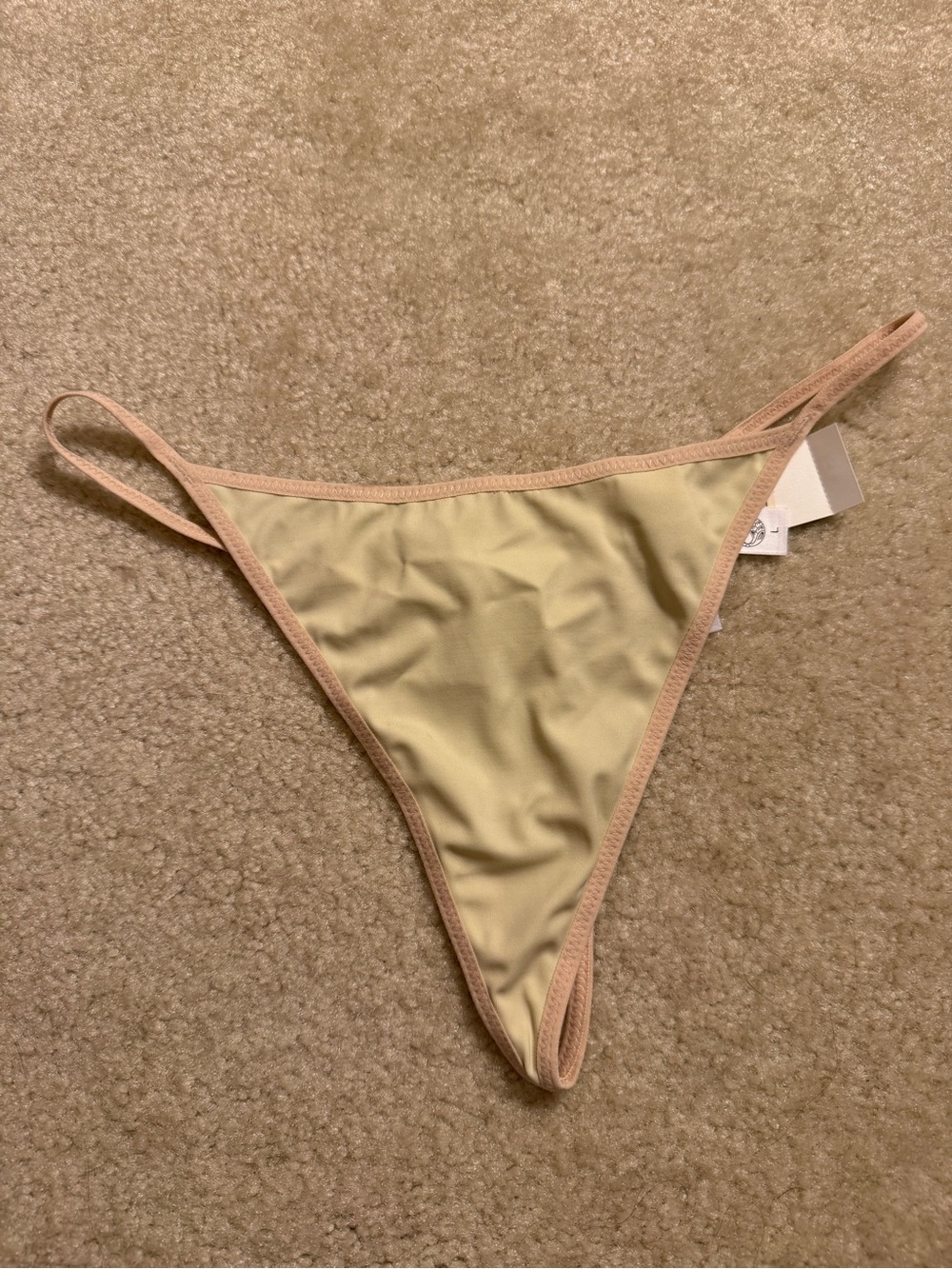 NWT Natori Women’s thong in Beige with Blush Trim